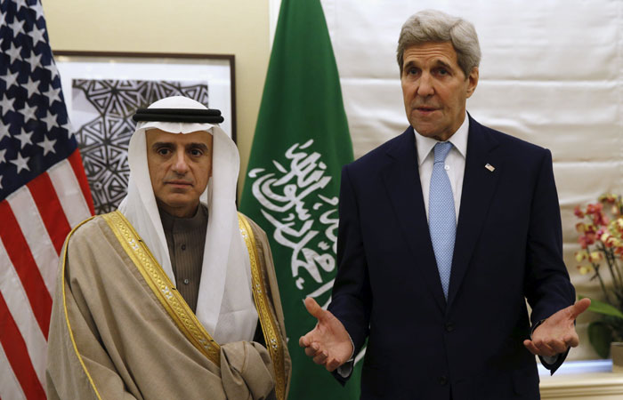 Foreign Minister Adel Al Jubeir and US Secretary of State John Kerry during their meeting in London Thursday. — Reuters