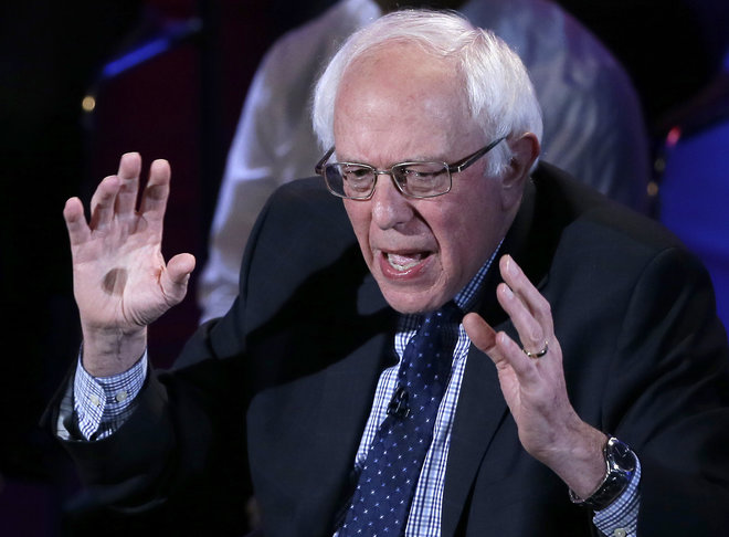 Democratic presidential candidate Sen. Bernie Sanders I-Vt argues a point during the Brown & Black Forum in Des Moines Iowa. Sanders has been putting up major advertising cash to seize momentum heading into the Democrati