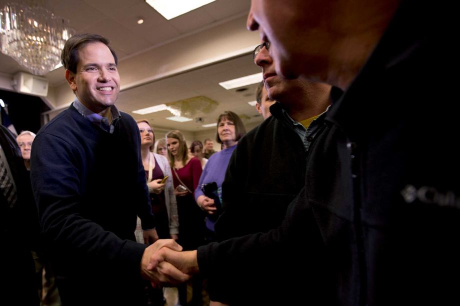 Republican presidential candidate Sen. Marco Rubio R-Fla. greets supporters during a campaign event Sunday Jan. 24 2016 in Cedar Rapids Iowa