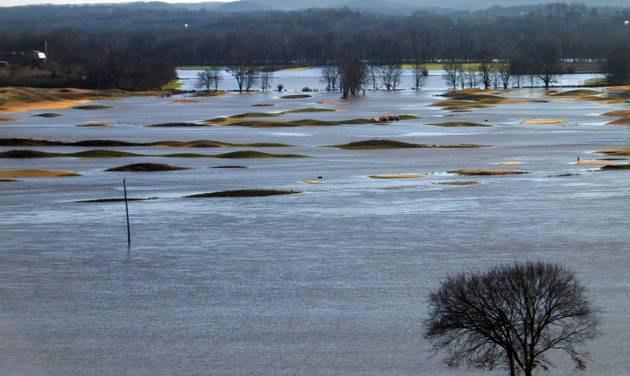 The flooded Crescent area of west St. Louis County Mo. including the Aberdeen Golf Club near Eureka is seen from the overlook in Bluff View Park on Friday Jan. 1 2016. The worst of the dangerous deadly winter flood is over in the St. Louis area