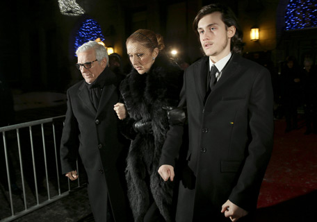 Celine Dion greets mourners in Rene Angelil's open casket viewing