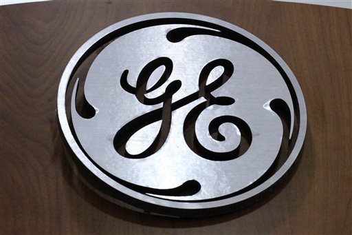 General Electric logo is displayed at a store in Cranberry Township Pa. GE is selling its health care lending unit and related loans to Capital One for roughly $9 billion as it shrinks its GE Capi