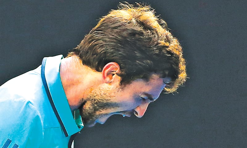 GILLES Simon of France reacts during his fourth-round match against Serbia’s Novak Djokovic on Sunday.—Reuters