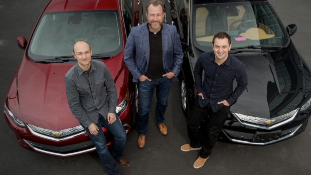 General Motors President Dan Ammann with Lyft Inc. co-founders John Zimmer and Logan Green General Motors President Dan Ammann with Lyft co-founders Logan Green and John Zimmer