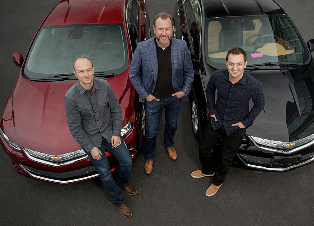 GM president Dan Ammann with Lyft co-founders John Zimmer and Logan Green