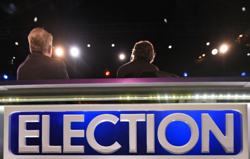 Dave Pregosin right lead stage manager and Jeff Hark left director of production sit in for moderators at the North Charleston Coliseum Wednesday Jan. 13 2016 in North Charleston S.C. in advance of Thursday's Fox Business Network Republic