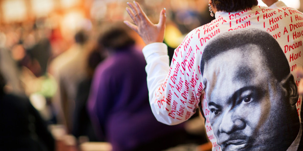 Gail Hollin wears a shirt bearing the image of the Rev