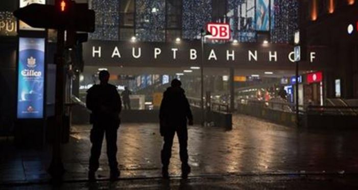 German special police stand in front of the Munich southern Germany main train station Thursday evening Dec. 31 2015 after police warned of 'imminent threat&#039 of terror attack and ordered two train stations to be cleared. (Sven Hoppe  dpa via