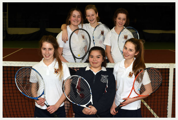 Girls from Deans Close School playing tennis at Oxstalls Sports Park