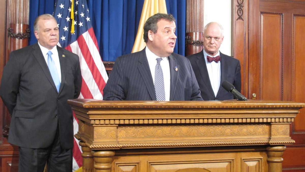 Flanked by New Jersey Senate President Steve Sweeney left and Atlantic City Mayor Don Guardian Gov. Chris Christie announces plans for the state to take control of Atlantic City finances