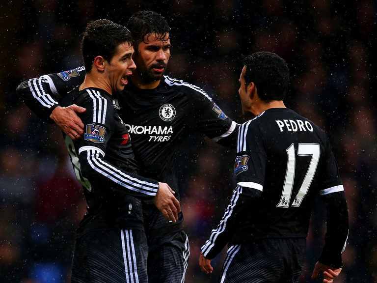 Oscar celebrates his goal with Diego Costa and Pedro