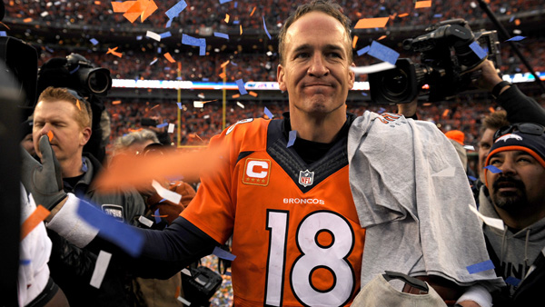 Peyton Manning of the Broncos walks off the field after defeating the New England Patriots in the AFC Championship Game at Sports Authority Field at Mile High on Sunday Jan. 24 2016