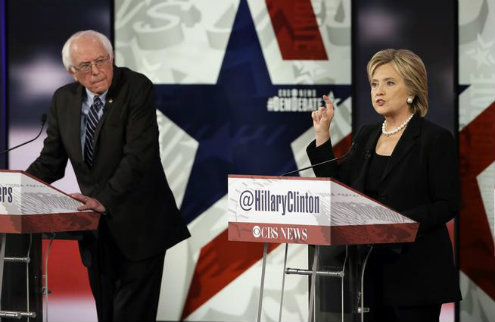 Hillary Rodham Clinton right makes a point as Bernie Sanders listens during a Democratic presidential primary debate on Nov. 14 in Des Moines Iowa