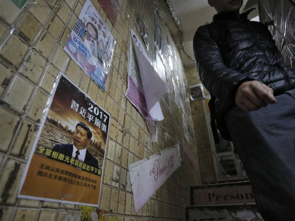 A man walks down the stairs of the closed Causeway Bay Bookstore which are known for gossipy titles about Chinese political scandals and other sensitive issues that are popular with visiting tourists from the mainland in Hong Kong Sunday Jan. 3 2016