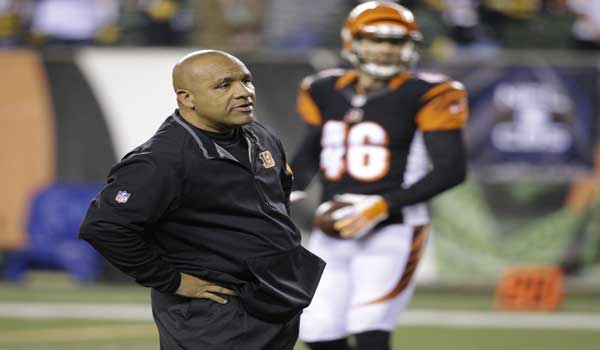 Cincinnati Bengals offensive coordinator Hue Jackson watches before an NFL wild-card playoff football game between the Cincinnati Bengals and the Pittsburgh Steelers Saturday Jan. 9 2016 in Cincinnati