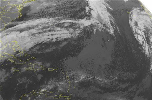 This NOAA satellite image taken Thursday Jan. 14 2016 at 12:45 AM EST shows a stationary front across the Bahamas and Cuba. Widespread rain showers accompany this boundary as it slowly drifts to the south. The remainder of the Caribbean basin is quiet