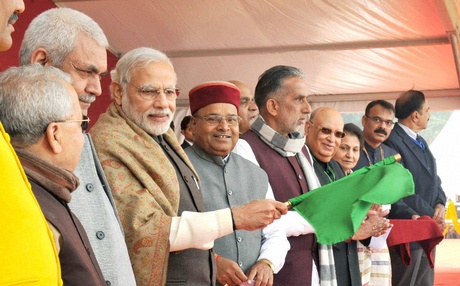 Prime Minister Narendra Modi flagging off the state-of-the-art'Mahamana Express Varanasi-Lucknow-Delhi in Varanasi Uttar Pradesh on Friday. Union Minister for Social Justice and Empowerment Thaawar Chand Gehlot Union Minister for Micro Small and Medium