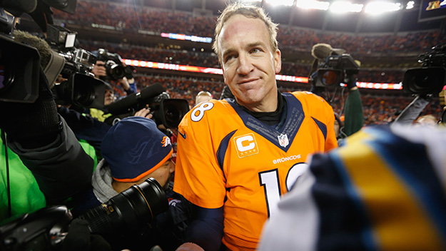 Peyton Manning of the Denver Broncos stands at midfield after a game against the San Diego Chargers