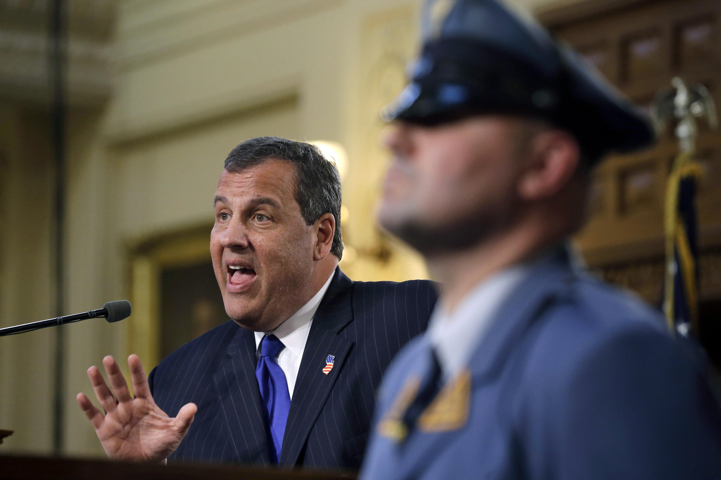 New Jersey Gov. Chris Christie gets round-the-clock protection regardless or where he is or the nature of his travels. As many as four state troopers like the one seen here in New Jersey accompany the governor when he travels to campaign