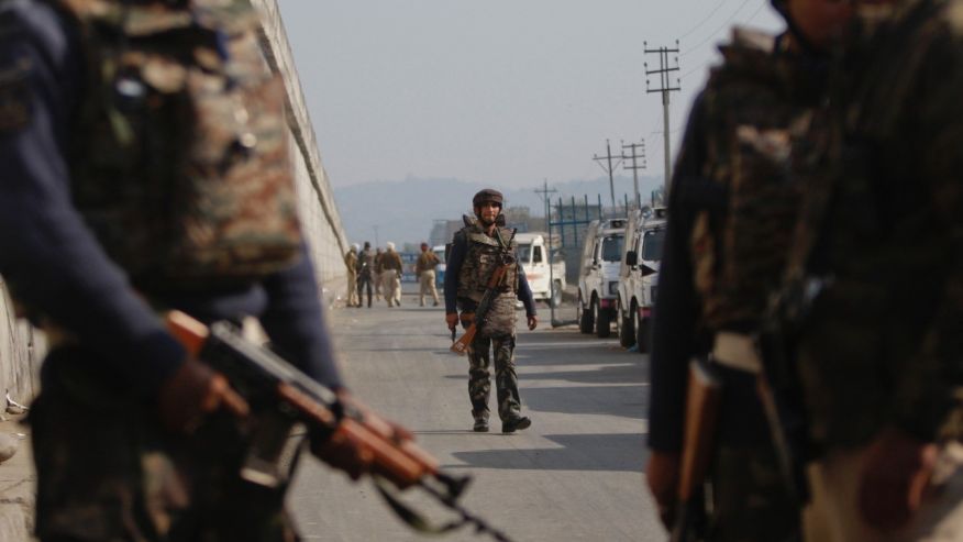 Indian troops patrol outside the Pathankot Air Force Base