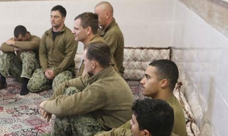 Iranian Revolutionary Guards on Wednesday Jan. 13 2016 shows detained American Navy sailors in an undisclosed location in Iran. They were later released