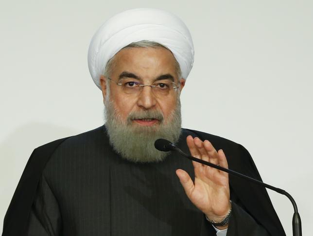 Iran President Hassan Rouhani talks during a business forum in Rome Italy