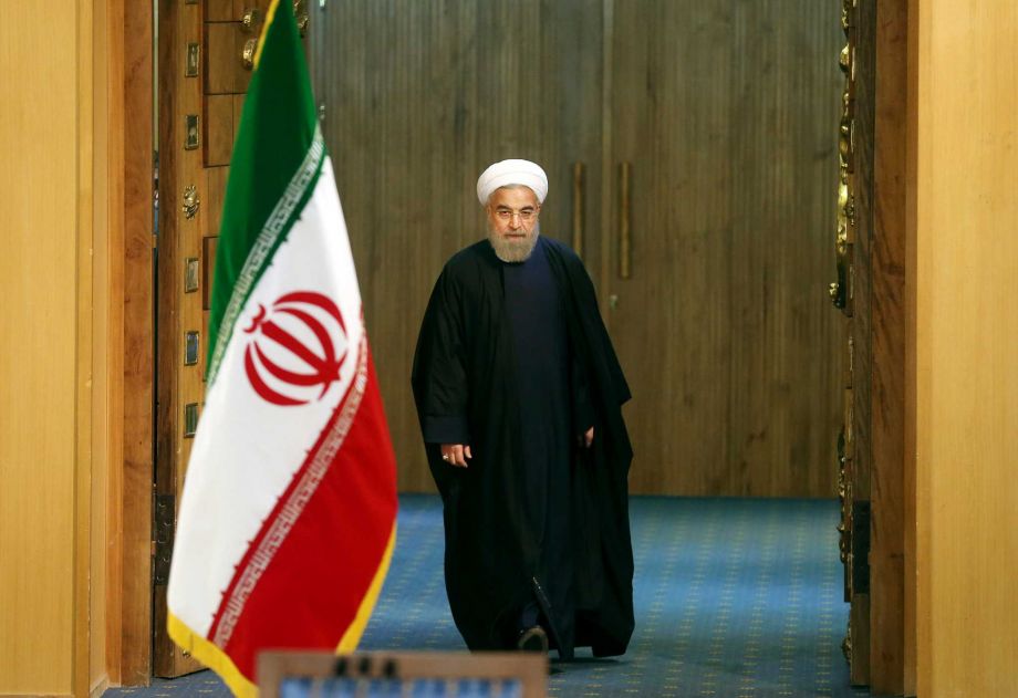 Iranian President Hassan Rouhani arrives for a news conference in Tehran Iran. The end of nuclear-related sanctions and the flurry of diplomacy that led to the release of Americans held by Iran suggests