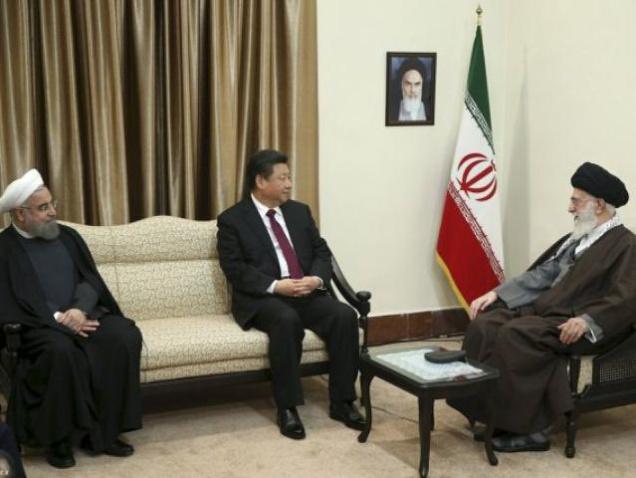 Iran's Supreme Leader Ayatollah Ali Khamenei meets Chinese President Xi Jinping in the presence of Iranian President Hassan Rouhani in Tehran on Saturday