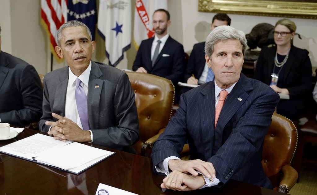 WASHINGTON DC- SEPTEMBER 10 U.S President Barack Obama and Secretary of State John Kerry meet with a small group of veterans and Gold Star Mothers to discuss the Iran nuclear deal in the Roosevelt Room of the White House