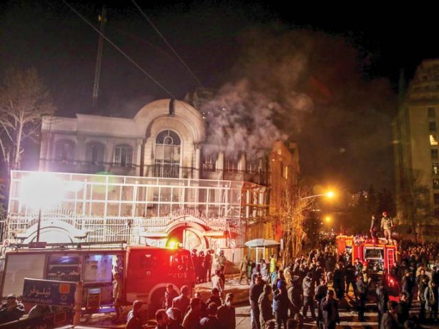 Iranian protesters set ablaze the Saudi embassy in Tehran during demonstrations against Nimr’s execution
