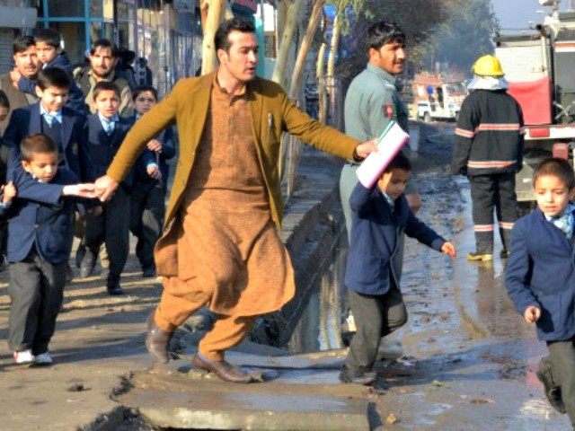 Running from site of clash in Jalalabad AP