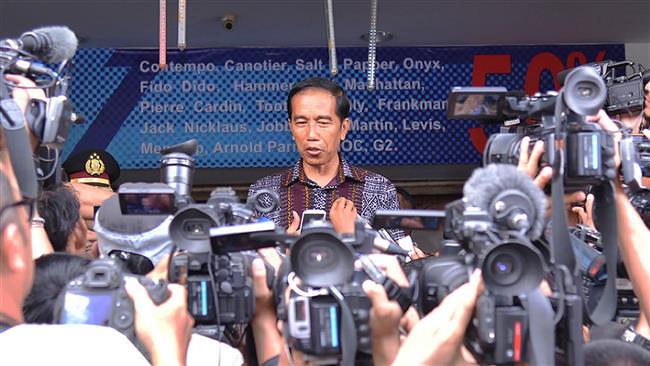 Indonesian President Joko Widodo speaks to journalists in Jakarta