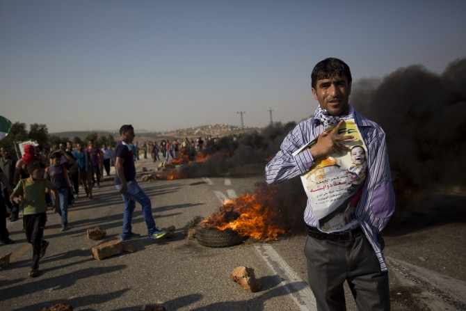 Jewish Israelis Charged Over Arson Attack on Palestinian Home