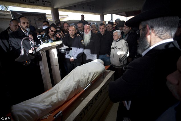 Sorrow The second victim was Shimon Rawimi 30 from the southern town of Ofakim. Friends and family gathered to mourn his death at the cemetery in his home town