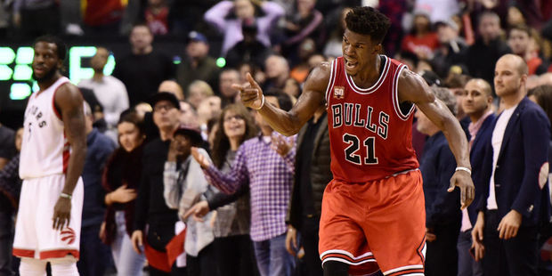 Jimmy Butler celebrates as he torches the Toronto Raptors