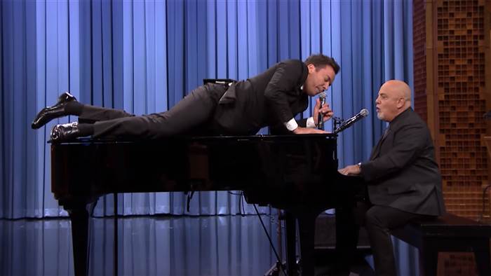 Jimmy Fallon  You Tube	


  Jimmy Fallon really gets into the music on'Beast of Burden with Billy Joel