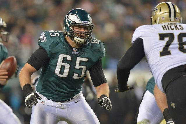 Johnson number 65 blocks against the New Orleans Saints at Lincoln Financial Field