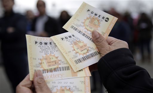 Powerball tickets are shown in San Lorenzo Calif. No ticket matched all six Powerball numbers following the drawing for a record jackpot of nearly $950 million lottery officials said early Sunday Jan. 10 boostin