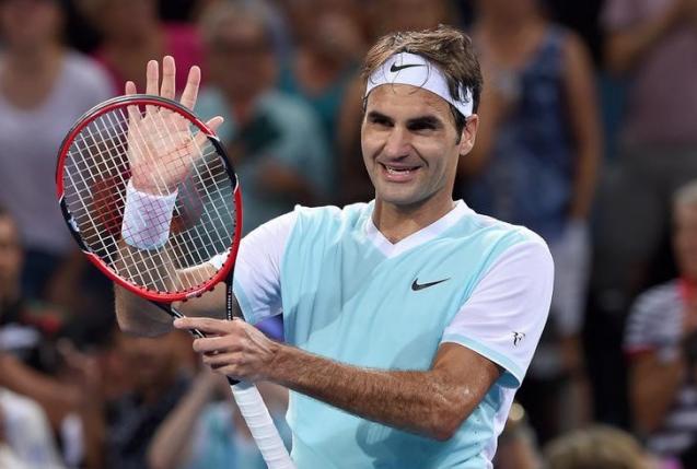 Roger Federer of Switzerland celebrates after winning his match against Grigor Dimitrov of Bulgaria at the Brisbane International Tennis Tournament in Brisbane Australia