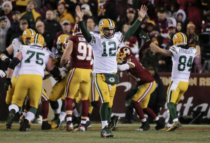 Mark Tenally Associated Press Packers quarterback Aaron Rodgers celebrates after running back Eddie Lacy scored during the second half of their wild-card game against the Redskins in Landover Md. on Sunday. AP