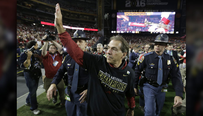 Alabama head coach Nick Saban waves to fans after the NCAA college football playoff championship game against Clemson Monday Jan. 11 2016 in Glendale Ariz. Alabama won 45-40