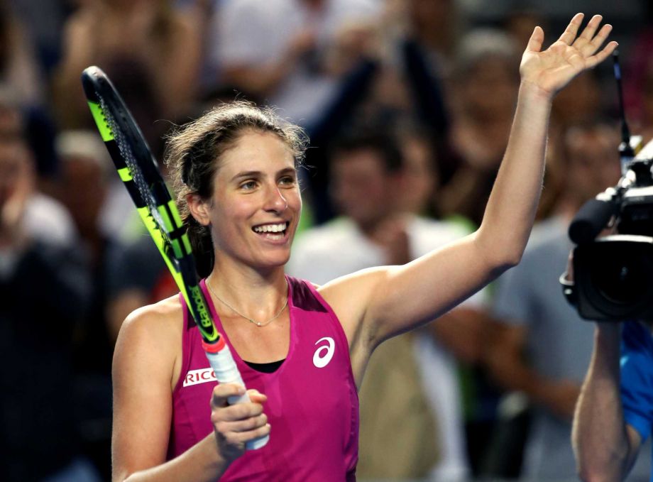 Johanna Konta of Britain celebrates after defeating Denisa Allertova of the Czech Republic in their third round match at the Australian Open tennis championships in Melbourne Australia Saturday Jan. 23 2016