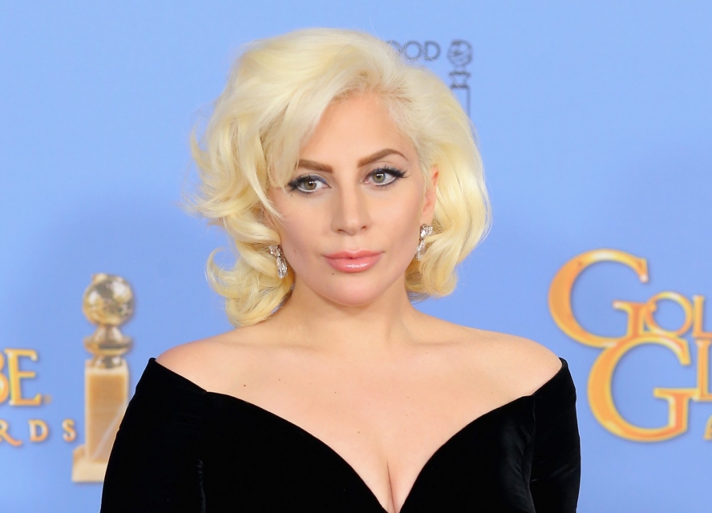 Lady Gaga poses in the press room during the 73rd Annual Golden Globe Awards