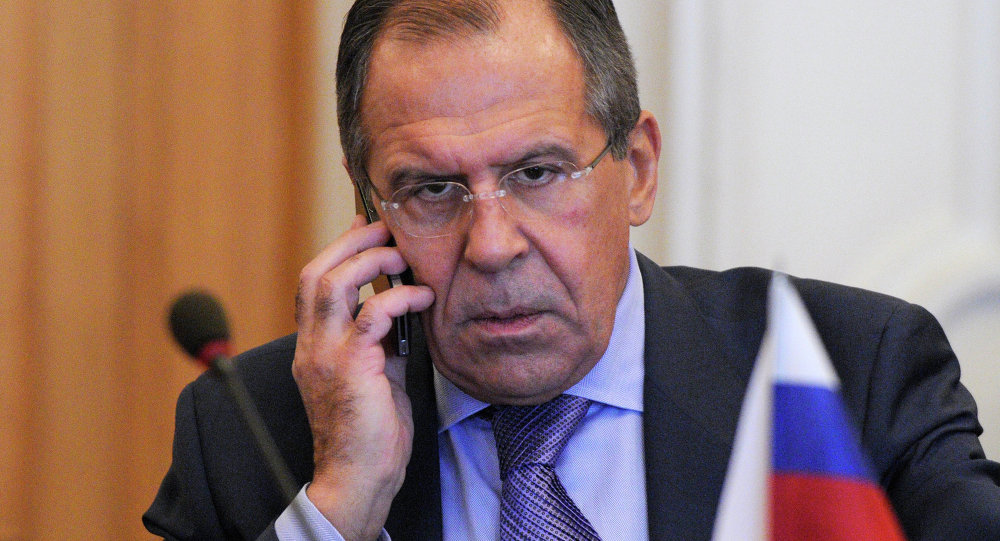 Russian Foreign Minister Sergey Lavrov speaks on the phone