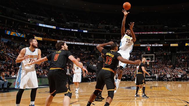 Kenneth Faried #35 of the Denver Nuggets takes a shot over Tristan Thompson #13 of the Cleveland Cavaliers at Pepsi Center