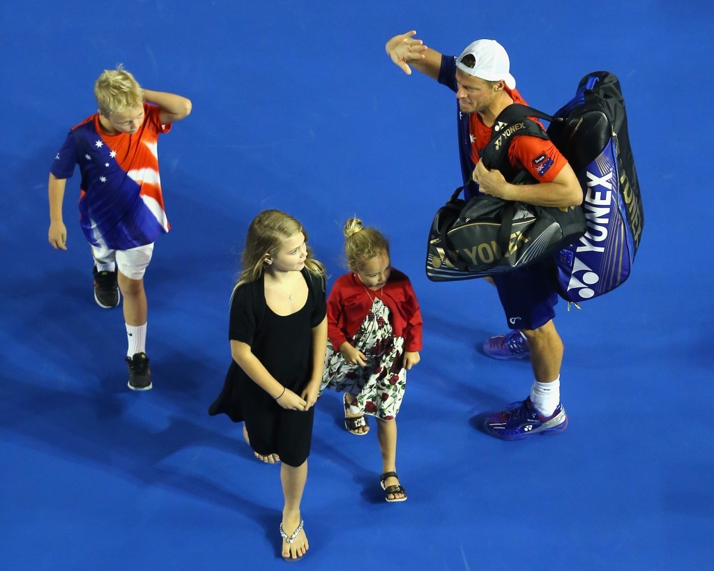 Lleyton Hewitt waves goodbye to the crowd after defeat to David Ferrer brought an end to his career