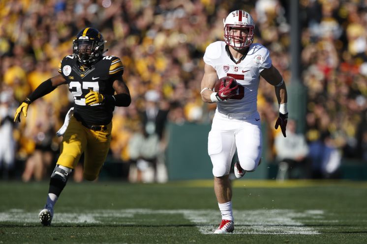 Christian Mc Caffrey breaks free for a 75-yard touchdown reception on the first play of the game