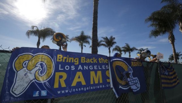 NFL fans Tom Bateman Skye Sverdlin Daniel Balma and Joe Ramirez show their support for the St. Louis Rams NFL team to come to Los Angeles