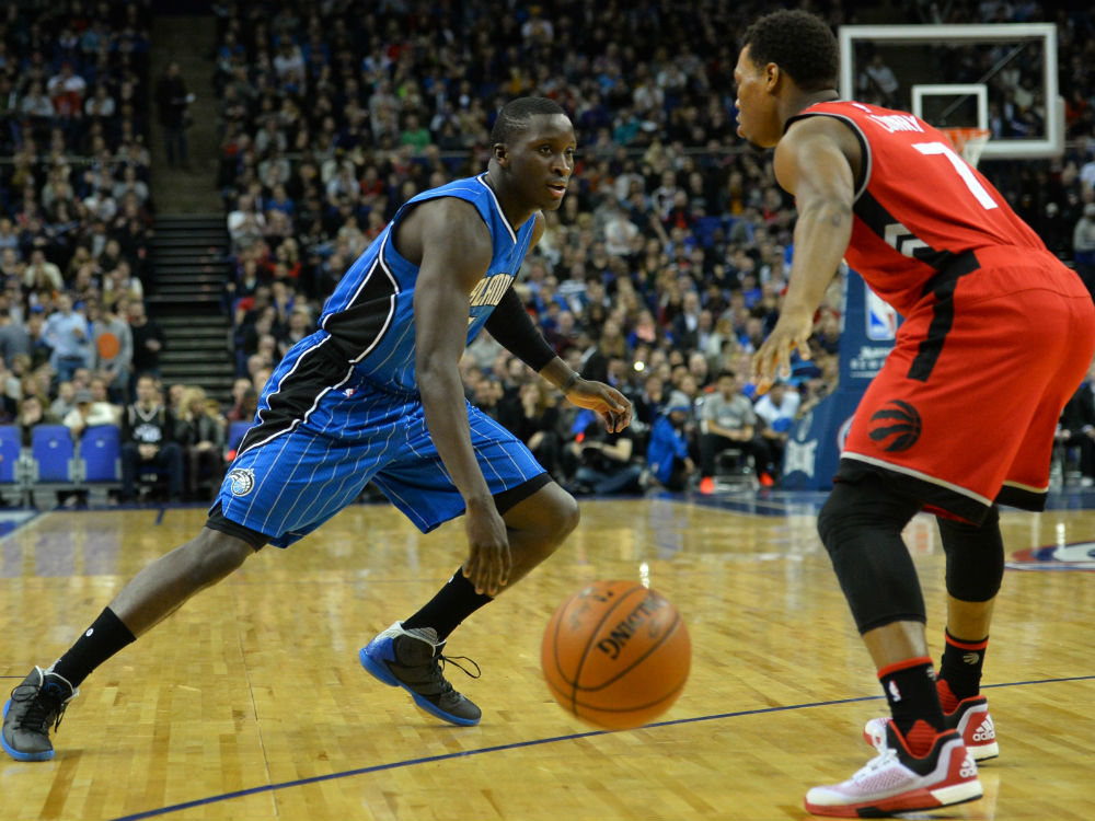 Orlando Magic Victor Oladipo runs by Toronto Raptors Kyle Lowry during the NBA Global Game London 2016 basketball match between Orlando Magic and Toronto Raptors at the O2 Arena in London