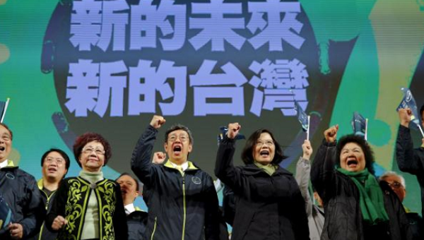 Democratic Progressive Party Chairperson and presidential candidate Tsai Ing-wen celebrates her election victory with other party members at the party